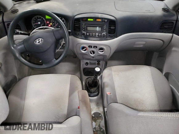 2006 Hyundai Accent GLS z VIN KMHCN46C56U036710, wystawiony jako Copart lot #84831284 z przebiegiem 202 556 mil mil oraz Nie do naprawy • Non repairable. Historia ofert i sprzedaży dostępna na DreamBid. Obrazek 8.