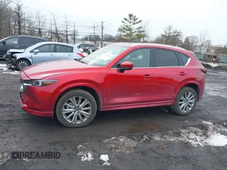 2023 Mazda CX-5 Signature with VIN JM3KFBXY3P0282456, listed as a IAAI auction lot 41542915 with 3,376 mi miles and . Bid and sale history available at carsss.com. Image 14.