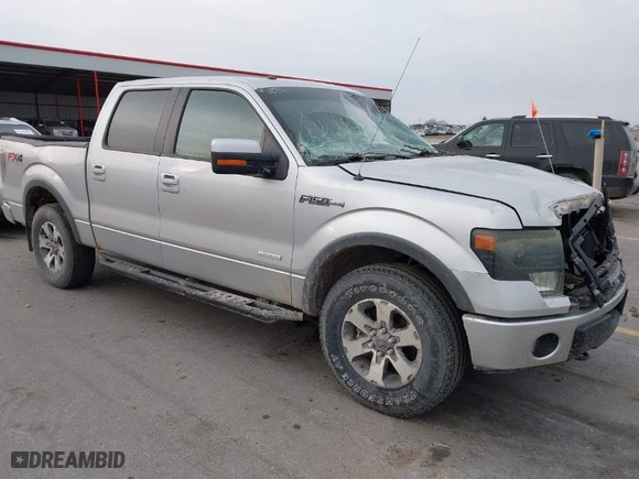 2013 Ford F-150 XL with VIN 1FTFW1ET8DFB81319, listed as a IAAI auction lot 41103635 with 218,615 mi miles. Bid and sale history available at carsss.com. Image 1.