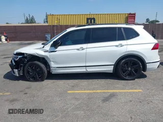 2024 Volkswagen Tiguan SE R-Line Black with VIN 3VVCB7AX7RM085619, listed as a IAAI auction lot 42325566 with 10,615 mi miles and . Bid and sale history available at DreamBid. Image 14.
