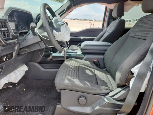 2023 Ford F-150 XL with VIN 1FTEW1CP9PKE72490, listed as a Copart auction lot 60045635 with 10,318 mi miles and Salvage title. Bid and sale history available at DreamBid. Image 7.