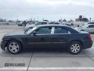 2006 Chrysler 300 Touring with VIN 2C3KA53G76H200278, listed as a IAAI auction lot 42044879 with 122,601 mi miles and . Bid and sale history available at DreamBid. Image 13.