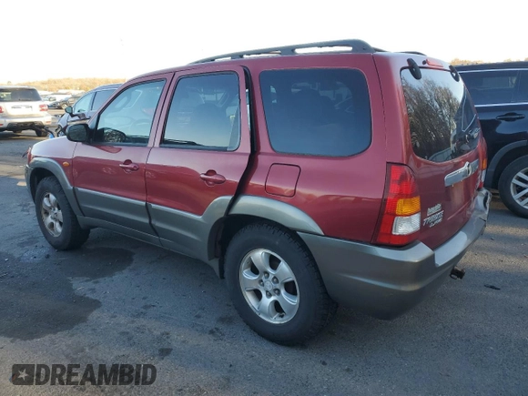 2001 Mazda Tribute LX with VIN 4F2CU08111KM19933, listed as a Copart auction lot 81174614 with 209,736 mi miles and Salvage Title. Bid and sale history available at DreamBid. Image 2.