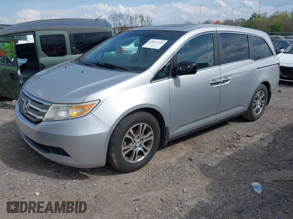 2012 Honda Odyssey EX-L with VIN 5FNRL5H68CB131431, listed as a IAAI auction lot 42012749 with 245,649 mi miles and . Bid and sale history available at carsss.com. Image 17.