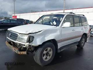 1999 Toyota Land Cruiser with VIN JT3HT05J1X0071346, listed as a IAAI auction lot 41215078 with 1 mi miles. Bid and sale history available at carsss.com. Image 2.
