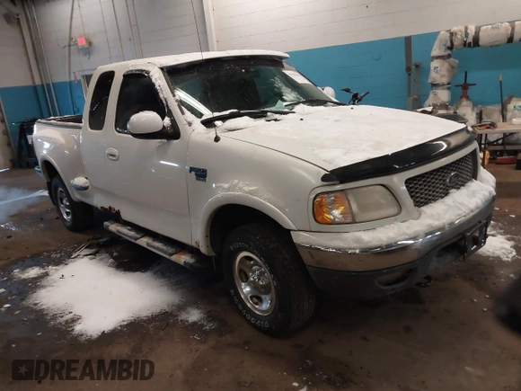 2000 Ford F-150 z VIN 2FTRX08W6YCA09298, wystawiony jako IAAI lot #41391038 z przebiegiem 179 738 mil mil oraz . Historia ofert i sprzedaży dostępna na DreamBid. Obrazek 1.