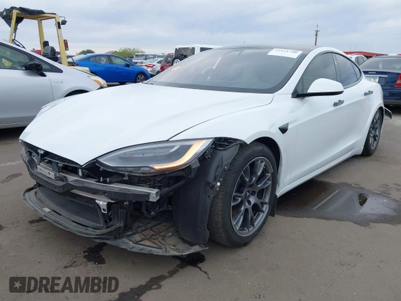 2021 Tesla Model S Long Range with VIN 5YJSA1E57MF453815, listed as a IAAI auction lot 41818700 with 51,176 mi miles and . Bid and sale history available at DreamBid. Image 20.