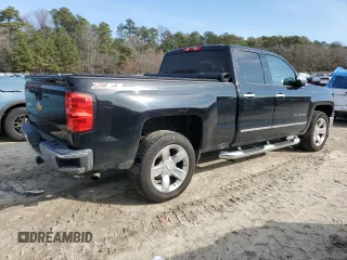 2014 Chevrolet Silverado 1500 LTZ with VIN 1GCVKSEC3EZ269921, listed as a Copart auction lot 84896084 with 136,671 mi miles and Salvage Title. Bid and sale history available at DreamBid. Image 3.