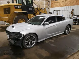 2021 Dodge Charger R/T with VIN 2C3CDXCT5MH522015, listed as a Copart auction lot 61149265 with 77,323 mi miles and Salvage title. Bid and sale history available at DreamBid. Image 1.