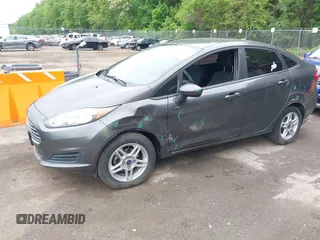 2019 Ford Fiesta SE z VIN 3FADP4BJ7KM155094, wystawiony jako IAAI lot #42186126 z przebiegiem 93 684 mil mil oraz . Historia ofert i sprzedaży dostępna na DreamBid. Obrazek 19.