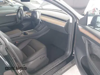 2023 Tesla Model Y Long Range with VIN 7SAYGDEE4PF789102, listed as a IAAI auction lot 41788860 with 88,457 mi miles and . Bid and sale history available at DreamBid. Image 5.