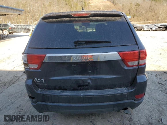 2012 Jeep Grand Cherokee Laredo with VIN 1C4RJFAG5CC289172, listed as a Copart auction lot 48679985 with 133,581 mi miles and Salvage Title. Bid and sale history available at carsss.com. Image 6.