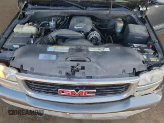 2001 GMC Yukon SLT z VIN 1GKEK13T21J165558, wystawiony jako Copart lot #52200565 z przebiegiem 291 699 mil mil oraz Szkoda całkowita • Salvage title. Historia ofert i sprzedaży dostępna na DreamBid. Obrazek 12.