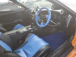 1993 Toyota Supra z VIN JZA800013665, wystawiony jako Copart lot #81811364 z przebiegiem 150 933 mil mil oraz Czysty tytuł • Clean title. Historia ofert i sprzedaży dostępna na DreamBid. Obrazek 8.