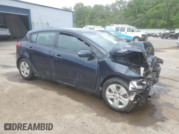2017 Kia Forte5 LX with VIN KNAFK5A85H5706866, listed as a Copart auction lot 52030735 with 179,000 mi miles and Salvage Title. Bid and sale history available at carsss.com. Image 4.