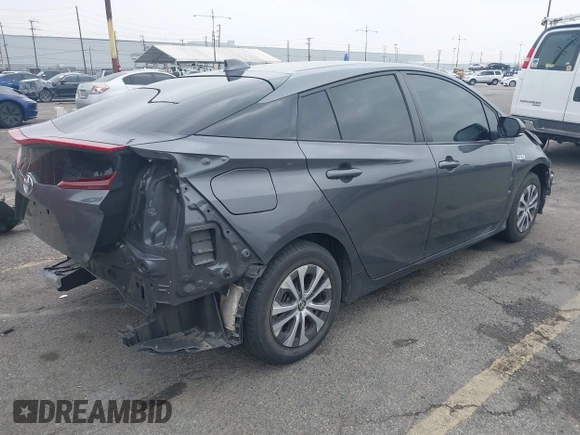 2021 Toyota Prius LE with VIN JTDKAMFP4M3194053, listed as a IAAI auction lot 42441091 with 47,290 mi miles and . Bid and sale history available at DreamBid. Image 4.