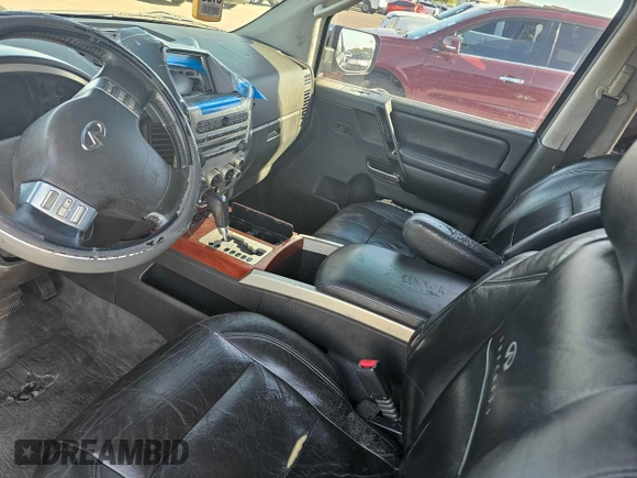 2004 Infiniti QX56 with VIN 5N3AA08A64N812493, listed as a Copart auction lot 77486754 with 0 mi miles and Salvage Title. Bid and sale history available at carsss.com. Image 9.