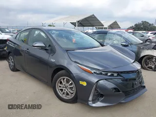2022 Toyota Prius LE z VIN JTDKAMFPXN3201623, wystawiony jako IAAI lot #41924562 z przebiegiem 68 359 mil mil oraz . Historia ofert i sprzedaży dostępna na DreamBid. Obrazek 1.