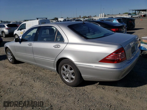 2002 Mercedes-Benz S-Class 5.0L with VIN WDBNG75JX2A306811, listed as a Copart auction lot 52042105 with 206,531 mi miles and Salvage Title. Bid and sale history available at carsss.com. Image 2.