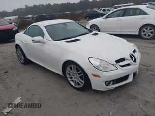 2009 Mercedes-Benz SLK-Class 3.0L with VIN WDBWK54FX9F190642, listed as a IAAI auction lot 41553743 with 74,335 mi miles. Bid and sale history available at carsss.com. Image 1.