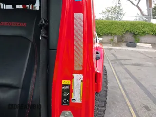 2021 Jeep Gladiator Rubicon with VIN 1C6JJTBGXML572976, listed as a IAAI auction lot 42134909 with 35,612 mi miles and . Bid and sale history available at DreamBid. Image 6.