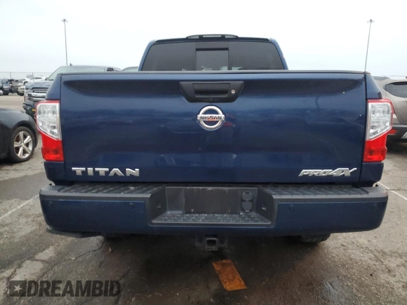 2018 Nissan Titan Pro-4X z VIN 1N6AA1E55JN505223, wystawiony jako Copart lot #85542844 z przebiegiem 113 601 mil mil oraz Szkoda całkowita • Salvage title. Historia ofert i sprzedaży dostępna na DreamBid. Obrazek 6.
