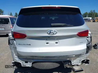 2019 Hyundai Santa Fe SE with VIN 5NMS2CAD9KH122140, listed as a IAAI auction lot 42616171 with 50,794 mi miles and . Bid and sale history available at DreamBid. Image 17.