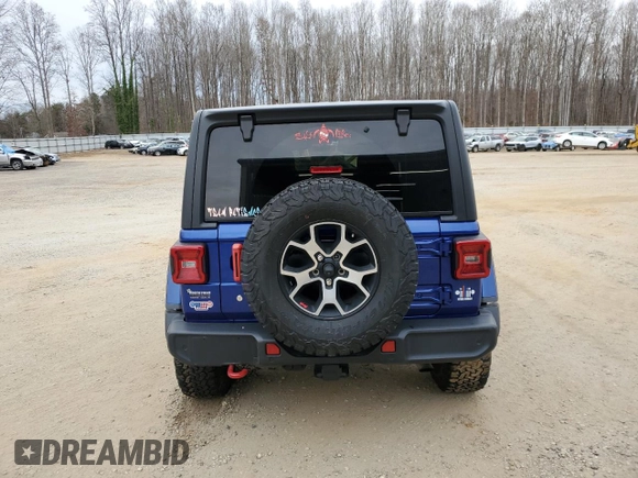 2020 Jeep Wrangler Unlimited Recon with VIN 1C4HJXFN4LW178832, listed as a Copart auction lot 71918762 with Not provided miles and Salvage title. Bid and sale history available at DreamBid. Image 6.