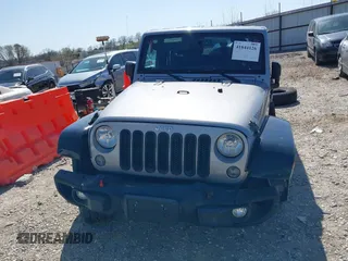 2015 Jeep Wrangler Unlimited Sport z VIN 1C4BJWDG0FL745533, wystawiony jako IAAI lot #41844126 z przebiegiem 151 620 mil mil oraz . Historia ofert i sprzedaży dostępna na DreamBid. Obrazek 13.
