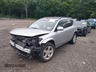 2004 Nissan Murano SE z VIN JN8AZ08W24W312041, wystawiony jako IAAI lot #39833782 z przebiegiem 72 664 mil mil oraz . Historia ofert i sprzedaży dostępna na DreamBid. Obrazek 2.
