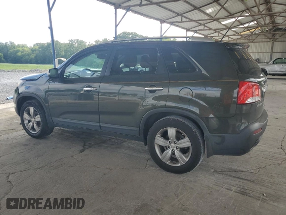 2012 Kia Sorento EX с VIN 5XYKU4A64CG261606, выставлен на аукционе Copart как лот 60863835 с пробегом 196 380 миль миль и Списание • Salvage title. История ставок и продаж доступна на DreamBid. Изображение 2.