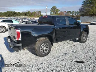 2022 GMC Canyon 4WD AT4 w/Cloth with VIN 1GTG6FEN2N1240091, listed as a Copart auction lot 85764964 with 25,881 mi miles and Salvage Title. Bid and sale history available at carsss.com. Image 3.