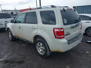2012 Ford Escape Limited with VIN 1FMCU0EG2CKB95451, listed as a IAAI auction lot 42103270 with 292,213 mi miles. Bid and sale history available at carsss.com. Image 3.