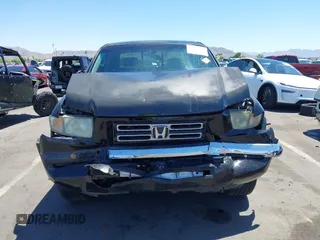 2008 Honda Ridgeline RTL with VIN 2HJYK16528H524064, listed as a IAAI auction lot 42588596 with 180,776 mi miles and . Bid and sale history available at DreamBid. Image 6.