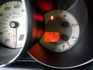 2007 Mazda 3 i Touring with VIN JM1BK32F571676258, listed as a Copart auction lot 87883545 with 141,203 mi miles and Salvage Title. Bid and sale history available at DreamBid. Image 9.