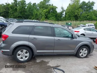 2012 Dodge Journey SXT with VIN 3C4PDCBB6CT392170, listed as a IAAI auction lot 42378262 with 120,640 mi miles and . Bid and sale history available at DreamBid. Image 13.