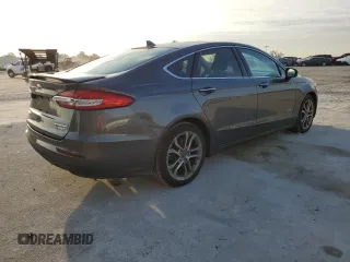 2019 Ford Fusion Hybrid Titanium with VIN 3FA6P0RU9KR116785, listed as a Copart auction lot 68052202 with 89,486 mi miles. Bid and sale history available at carsss.com. Image 3.