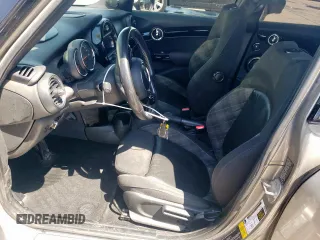2017 MINI Hardtop 4 Door Cooper with VIN WMWXU1C53H2E18438, listed as a Copart auction lot 52871475 with 133,235 mi miles and Salvage Title. Bid and sale history available at DreamBid. Image 7.