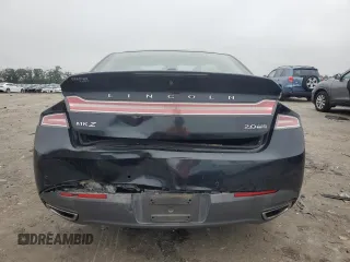 2014 Lincoln MKZ with VIN 3LN6L2J97ER817852, listed as a Copart auction lot 60980885 with 77,194 mi miles and Salvage title. Bid and sale history available at DreamBid. Image 6.