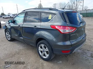2016 Ford Escape SE z VIN 1FMCU9G92GUC37694, wystawiony jako IAAI lot #41917697 z przebiegiem 78 511 mil mil oraz . Historia ofert i sprzedaży dostępna na DreamBid. Obrazek 3.