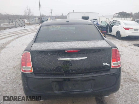 2013 Chrysler 300 with VIN 2C3CCABT7DH652797, listed as a IAAI auction lot 41602405 with 203,920 mi miles. Bid and sale history available at carsss.com. Image 16.