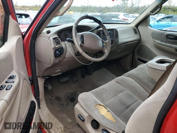 2001 Ford F-150 XL z VIN 1FTRX08L91KF90321, wystawiony jako Copart lot #79450044 z przebiegiem 320 953 mil mil oraz Czysty tytuł • Clean title. Historia ofert i sprzedaży dostępna na DreamBid. Obrazek 8.