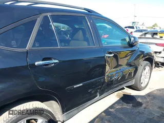 2008 Lexus RX 400h with VIN JTJHW31U582866777, listed as a IAAI auction lot 41880851 with 211,495 mi miles and . Bid and sale history available at DreamBid. Image 13.