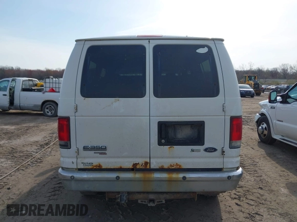 2014 Ford Econoline Passenger XL with VIN 1FBNE3BL8EDA40671, listed as a IAAI auction lot 42000919 with 399,196 mi miles and . Bid and sale history available at DreamBid. Image 14.