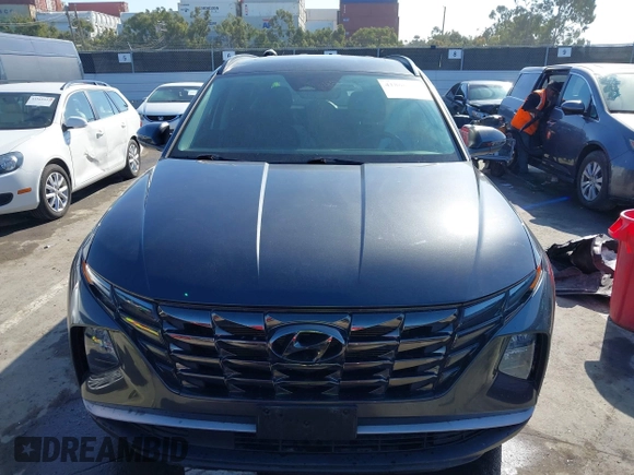 2022 Hyundai Tucson SEL with VIN 5NMJCCAEXNH061242, listed as a IAAI auction lot 41866145 with 63,501 mi miles and . Bid and sale history available at carsss.com. Image 11.
