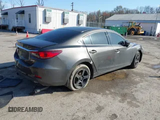 2016 Mazda 6 i Sport with VIN JM1GJ1U59G1402840, listed as a IAAI auction lot 41920724 with 147,527 mi miles and . Bid and sale history available at DreamBid. Image 4.