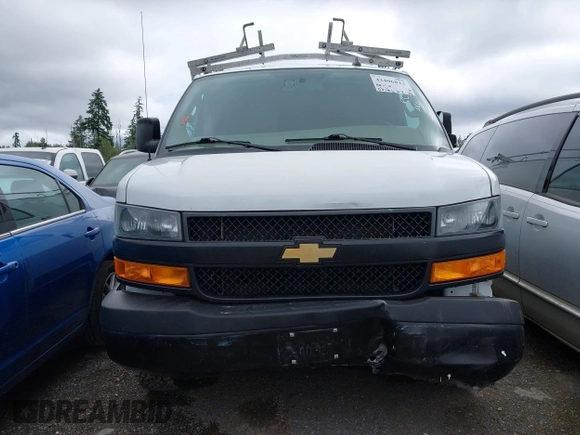 2020 Chevrolet Express Cargo z VIN 1GCWGAFGXL1276698, wystawiony jako IAAI lot #42406833 z przebiegiem 63 143 mil mil oraz . Historia ofert i sprzedaży dostępna na DreamBid. Obrazek 13.