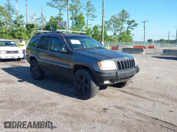 2002 Jeep Grand Cherokee z VIN 1J4GX38S32C238339, wystawiony jako IAAI lot #42653341 z przebiegiem 264 189 mil mil oraz . Historia ofert i sprzedaży dostępna na DreamBid. Obrazek 1.