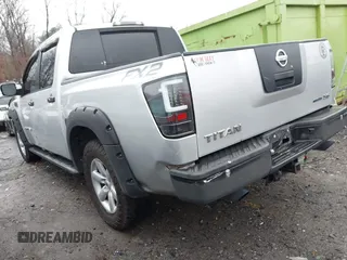 2010 Nissan Titan SE with VIN 1N6BA0EK3AN308362, listed as a IAAI auction lot 41406474 with 316,394 mi miles. Bid and sale history available at carsss.com. Image 3.
