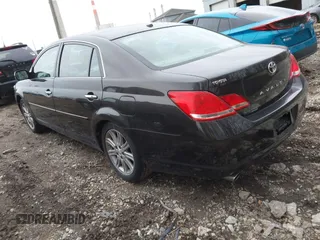 2010 Toyota Avalon XL with VIN 4T1BK3DB7AU359643, listed as a IAAI auction lot 41561066 with 171,526 mi miles and . Bid and sale history available at carsss.com. Image 3.